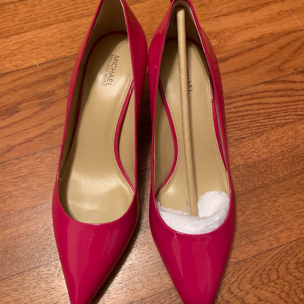 Michael Kors pink patent pumps